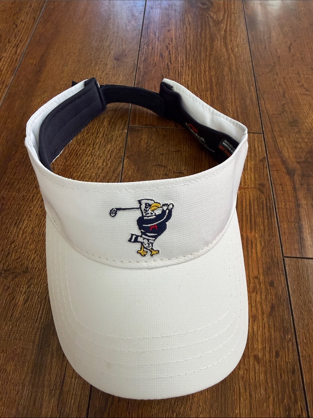 White Women's Golf Visor with Embroidered Golfer Motif